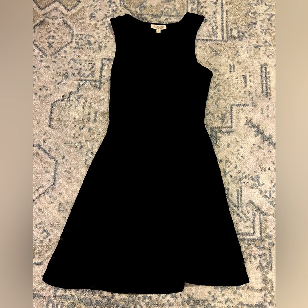 Little black dress with mesh on chest and bottom of dress, very flattering on